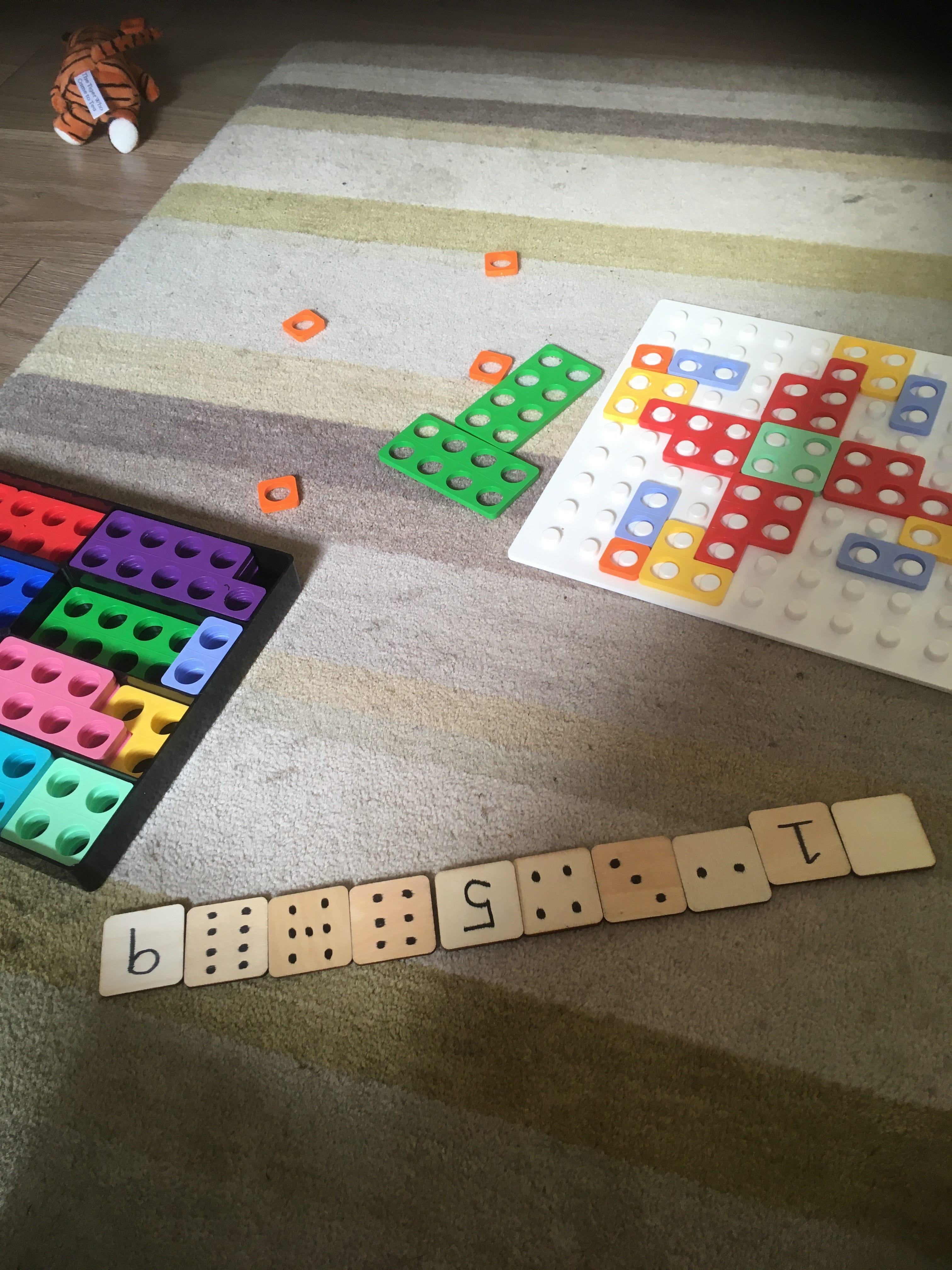 Image Description: Dominoes using a mix of numbers and numerals
